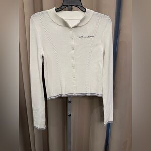 Ann Andelman missing all tags.